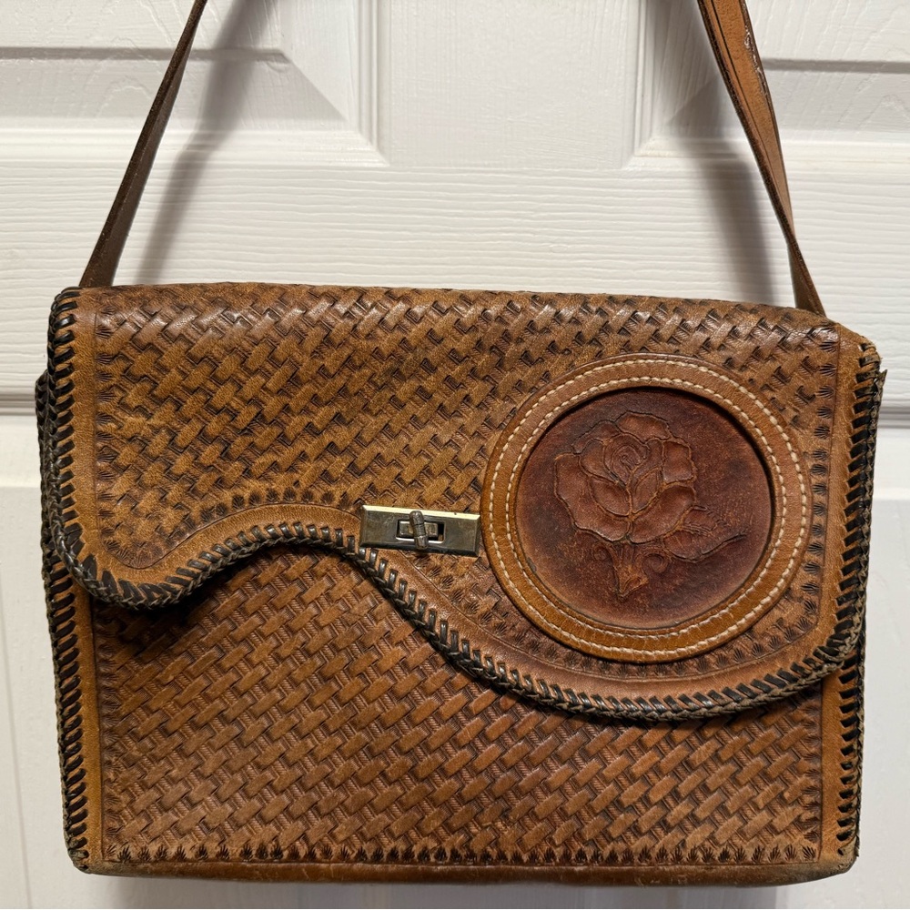 Vintage tooled Leather shoulder bag.